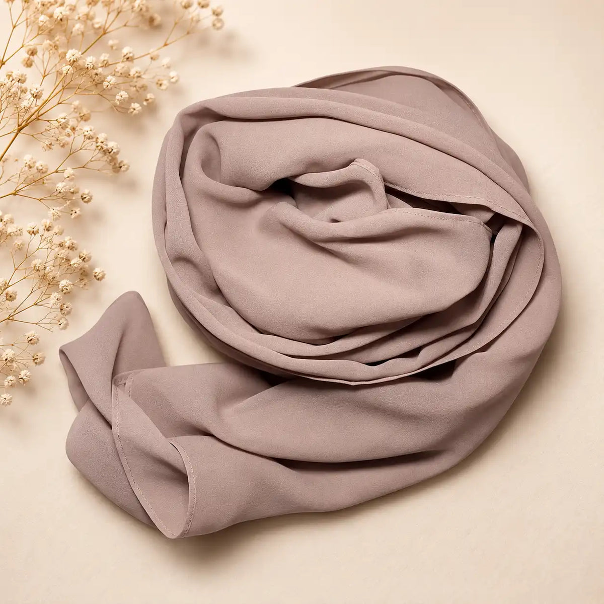Plain georgette hijab in mauve taupe fabric close up texture