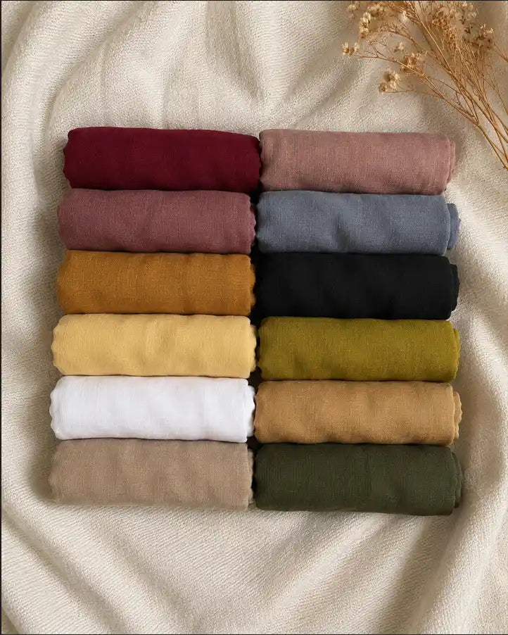 Turkish lawn hijab fabric rolls in multiple colors collection display