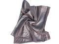 Folded gray and white striped fabric on a white background