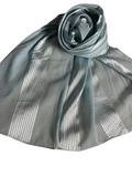Gray scarf with a subtle pattern on a white background