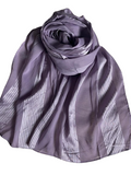 Purple scarf with a subtle pattern on a white background