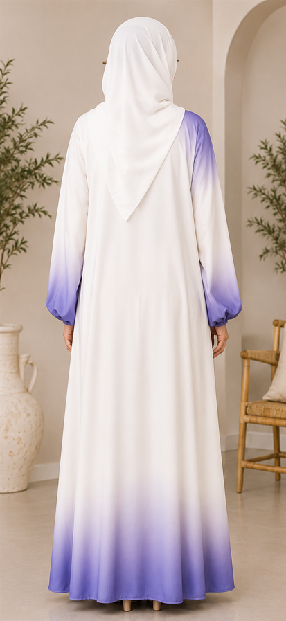 Woman wearing a white and purple gradient dress with a hijab in an indoor setting.