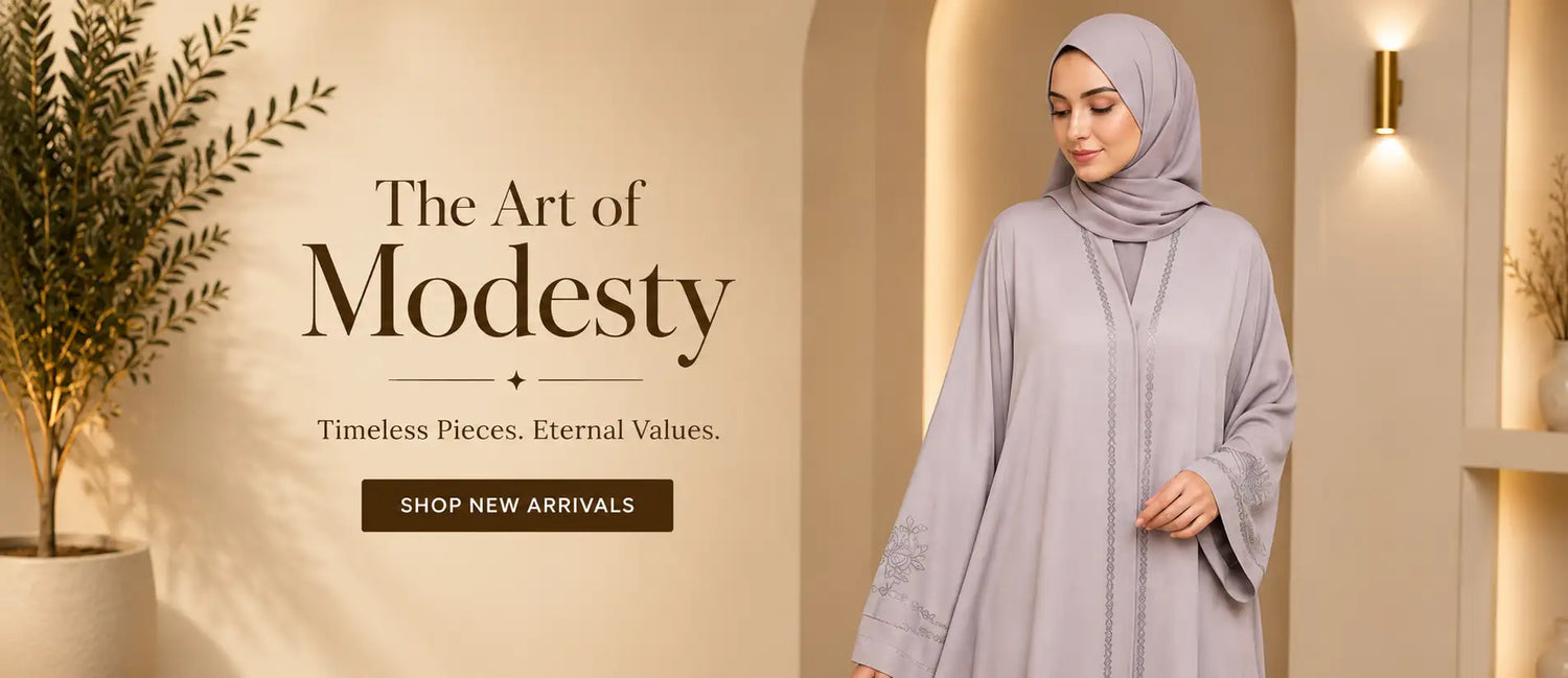 Woman wearing grey embroidered abaya with matching hijab modest fashion banner