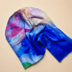 Slub lawn hijab blue purple watercolor mix flat lay showing fabric texture
