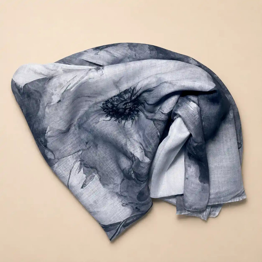 Slub lawn hijab grayish black floral mix flat lay showing fabric texture