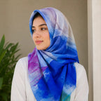 Woman wearing blue purple watercolor slub lawn hijab styled look