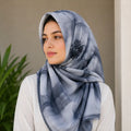 Woman wearing grayish black floral slub lawn hijab styled look