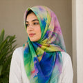 Woman wearing green blue rainbow multicolor slub lawn hijab styled look