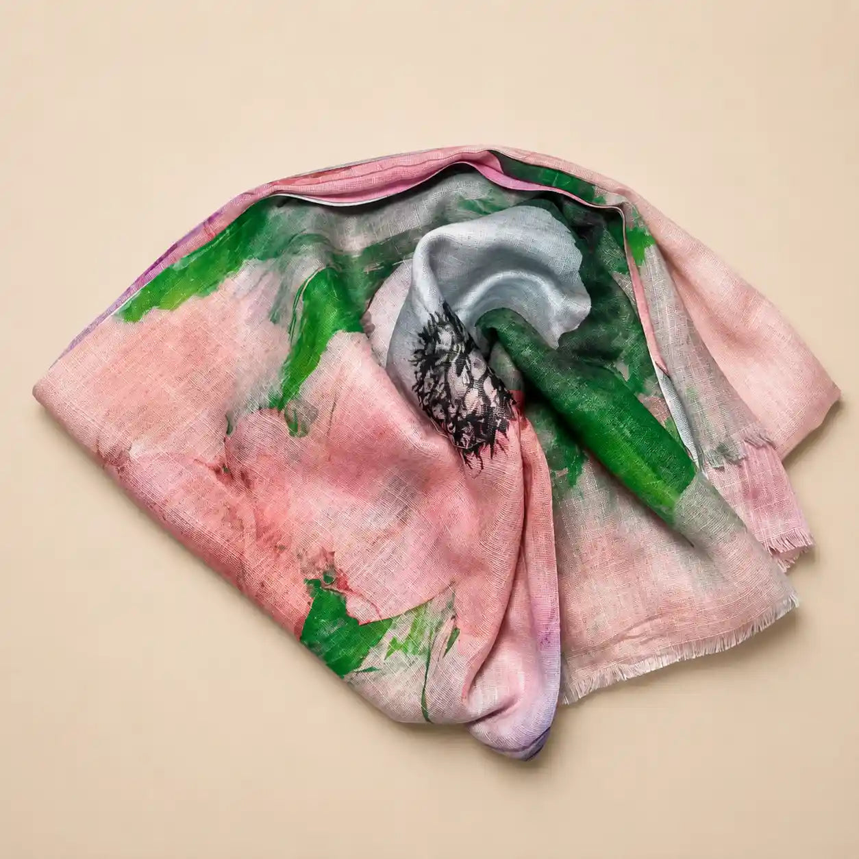 Slub lawn hijab light pink green watercolor mix flat lay showing fabric texture