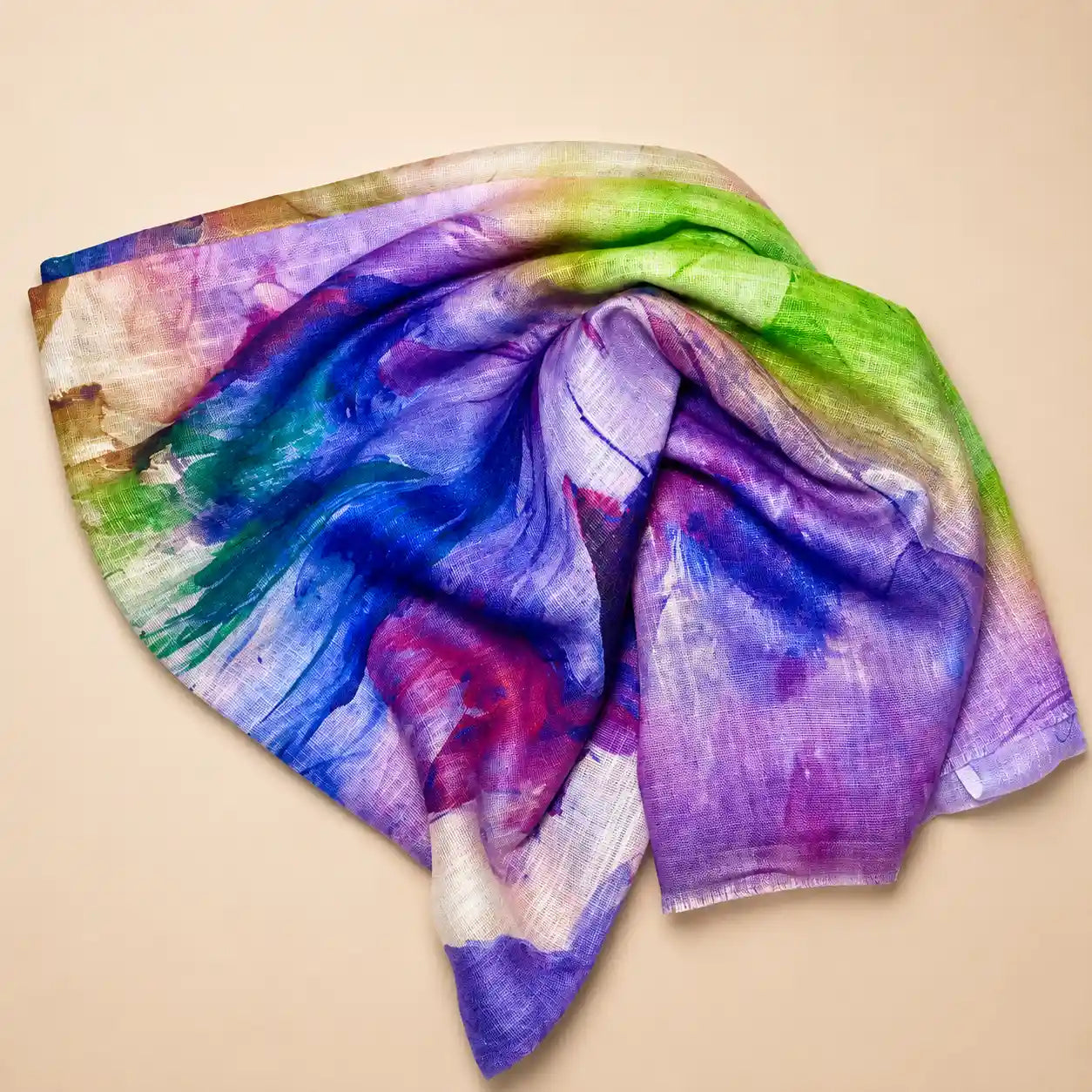 Slub lawn hijab purple blue green watercolor mix flat lay showing fabric texture