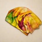 Slub lawn hijab yellowish green floral mix flat lay showing fabric texture